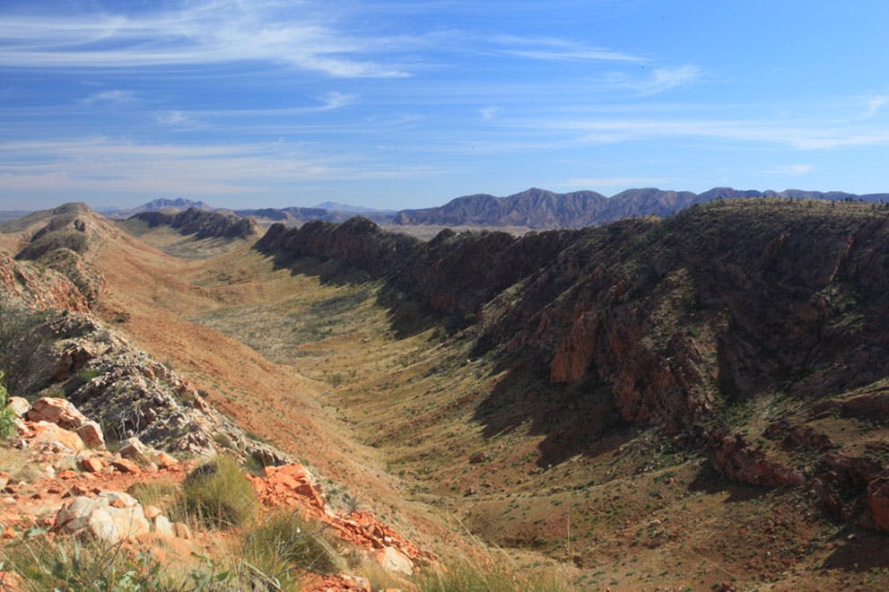 Expansive ridge with red rocks - gain a First Nations perspective to the Larapinta Connect experience